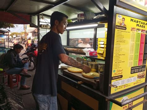 Sertifikat, penghargaan, tanda, atau dokumen yang dipajang di gorontTalLo vVirRal TwItTeR sebagai pilihan tepat penjual martabak keliling